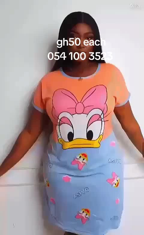 Disney Daisy Duck Sleep Dress - Mid-length t-shirt dress with vibrant two-tone color block design featuring bright peach/orange top half, soft baby blue bottom, large centered Daisy Duck graphic on bodice, and repetitive mini-character pattern on skirt